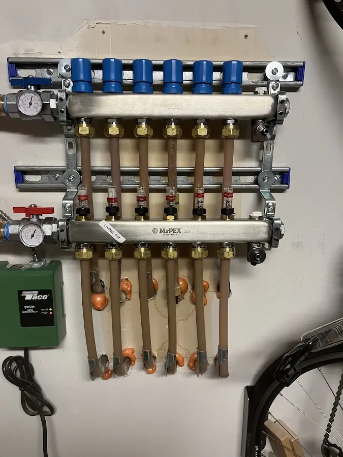 Plumber performing Leak Detection at a residential property in Rossford